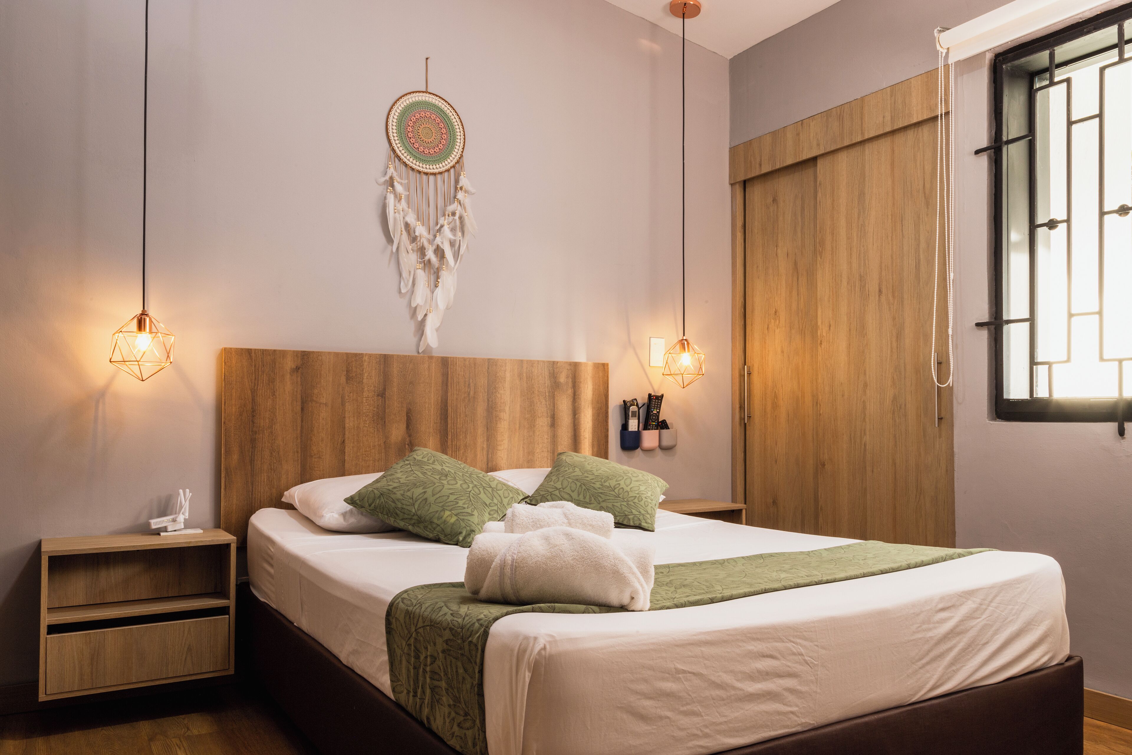 In-room safe, desk, laptop workspace, bed sheets