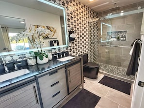 Shower, hair dryer, towels, soap
