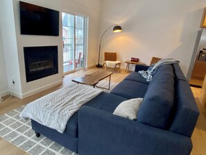 Smart TV, fireplace, books