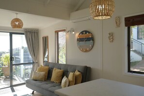 Superior Chalet, 1 Bedroom, Hot Tub, Sea View | Living area - Palm Beach Chalets (Waiheke Island)