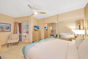Deluxe Condo, Lanai | 1 bedroom, iron/ironing board, free WiFi, bed sheets