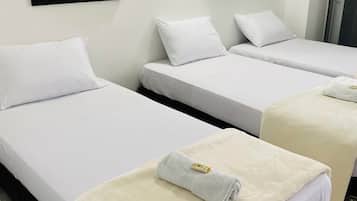 Junior Triple Room | Blackout drapes, iron/ironing board, free WiFi, bed sheets