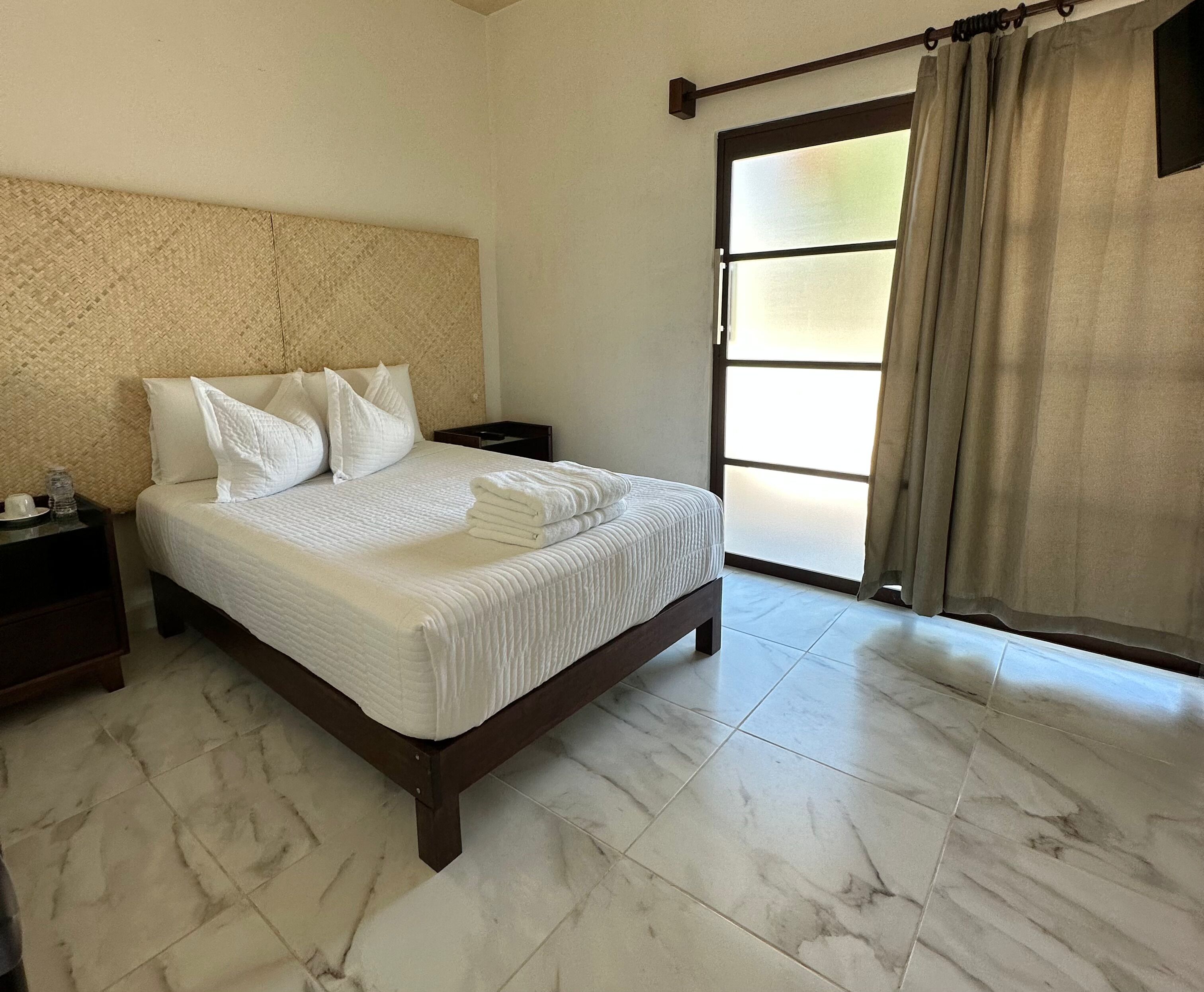 Standard Room | Individually furnished, blackout drapes, iron/ironing board, free WiFi