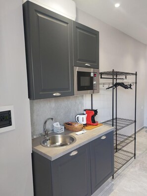 Fridge, microwave, coffee/tea maker, electric kettle