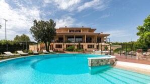 A large, two-story building with a swimming pool in front. - Amazing home in Gualdo Cattaneo (PG) (Gualdo Cattaneo (PG))