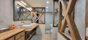 Eco-friendly toiletries, hair dryer, towels, soap