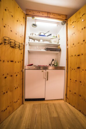 Full-sized fridge, stovetop, espresso maker, electric kettle