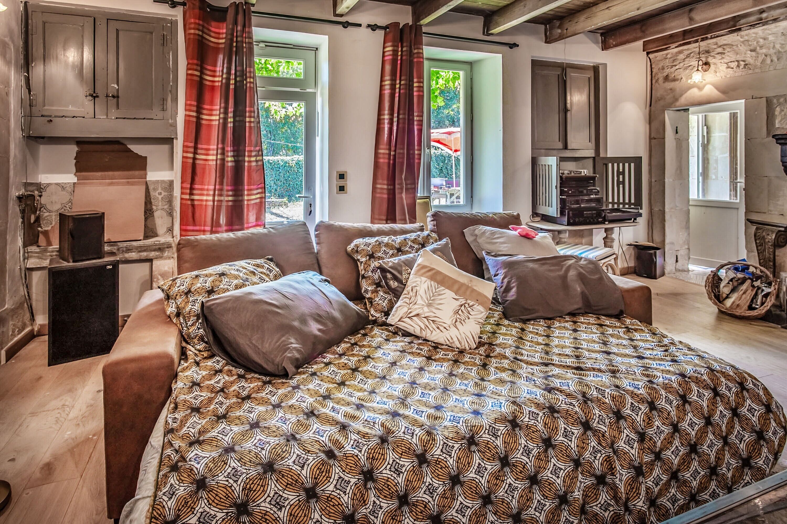 1 slaapkamer, een strijkplank/strijkijzer, beddengoed
