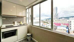 Apartment, 1 Bedroom, Accessible, Balcony | Private kitchen - Heritage - Modern Studio Shared Pool, City Centre (Patong)