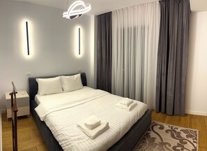 1 chambre, fer et planche à repasser, Wi-Fi gratuit, draps fournis