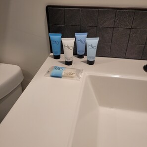 Shower, towels, soap, toilet paper