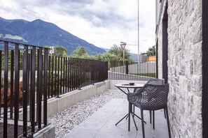 Apartamento | Restaurante al aire libre