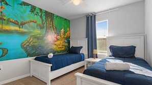 A bedroom with two beds, a mural, a ceiling fan, and a window with blinds. - Family House near Disney - 5109 (Kissimmee)