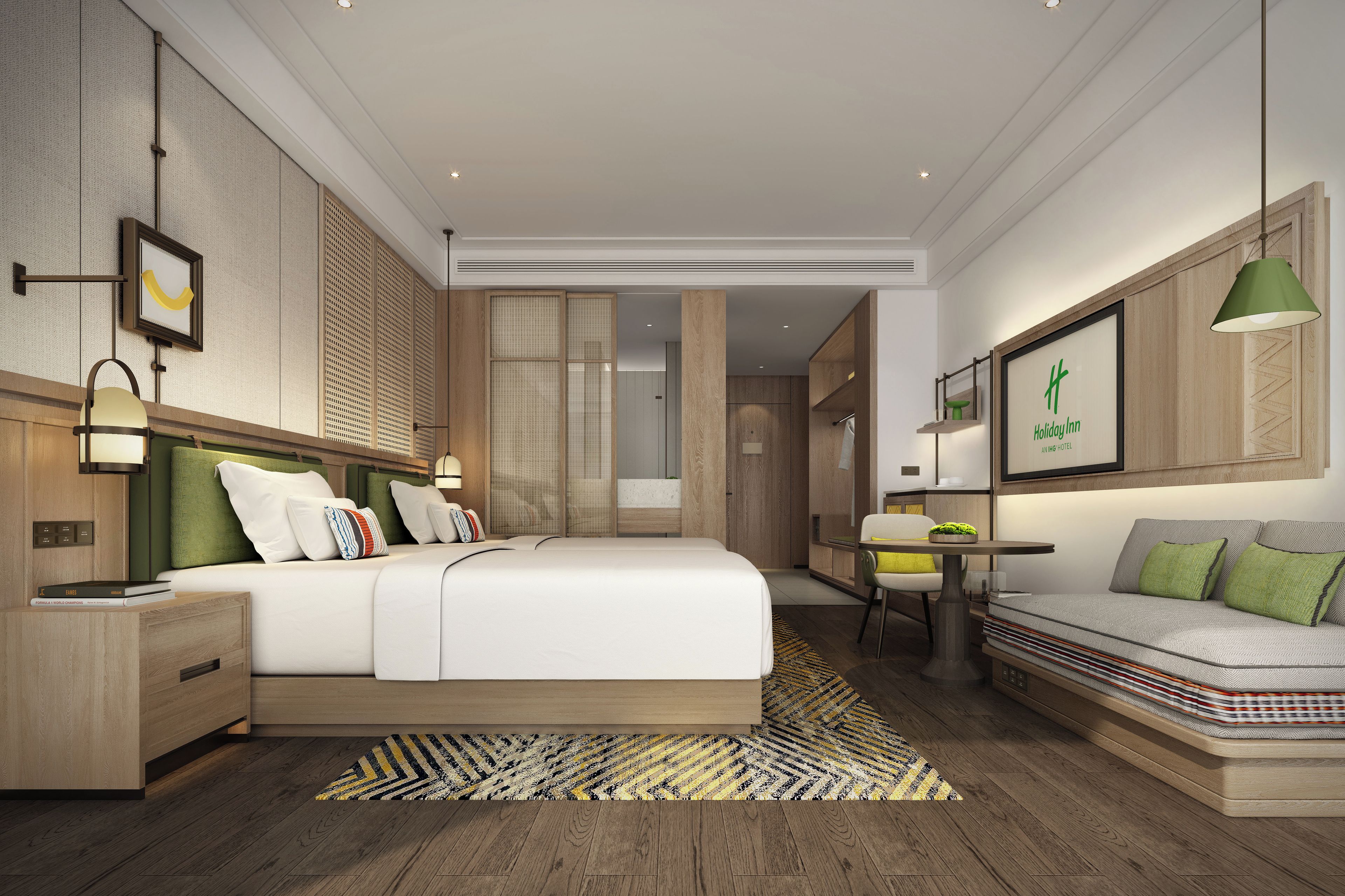 A modern hotel room with a large bed, a sofa, a desk, and a dining area.