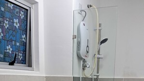A bathroom with a toilet, bidet, and shower. - The Red Room @ Alanis Residence Sepang, KLIA1 and KLIA2 (Sepang)