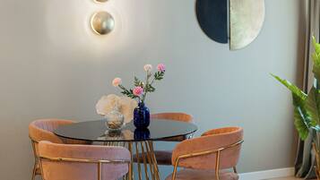 Deluxe Apartment, 2 Bedrooms, Balcony, City View | Living area | 42-inch Smart TV with cable channels, Netflix, streaming services