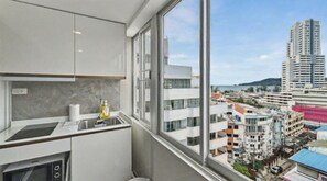 Fridge, microwave, stovetop, coffee/tea maker