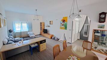 Apartment (Two Bedroom Apartment with Terrace) | Living room | 32-inch flat-screen TV with cable channels