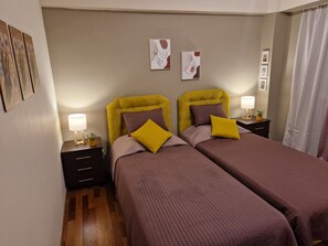 2 habitaciones, tabla de planchar con plancha, wifi y ropa de cama 