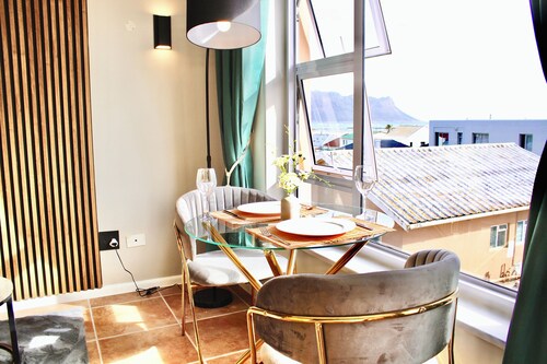 Yellow Couch Studio Apartment Strand,Cape Town with 1 KingBed, WiFi access