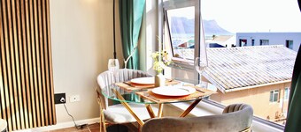 Yellow Couch Studio Apartment Strand,Cape Town with 1 KingBed, WiFi access