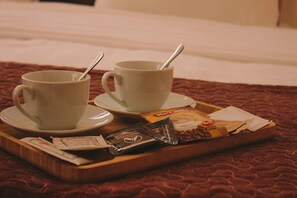 Premium bedding, desk, laptop workspace, soundproofing