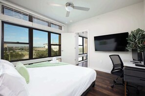 1 bedroom, desk, iron/ironing board, travel crib