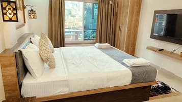 Couette en duvet d'oie, matelas Select Comfort, minibar