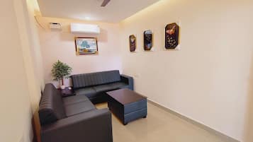 Family Room | Living area | 32-inch LED TV with digital channels, streaming services, offices