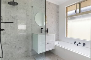 Shower, hair dryer, towels, soap