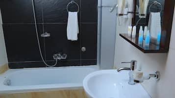 Hair dryer, towels, soap, shampoo