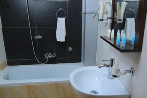 Hair dryer, towels, soap, shampoo
