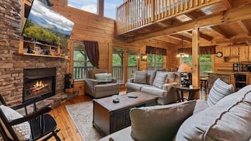 Cabin, Multiple Beds, Hot Tub, Mountain View (Triple Mountain View) | Living area | 50-inch flat-screen TV with digital channels, fireplace