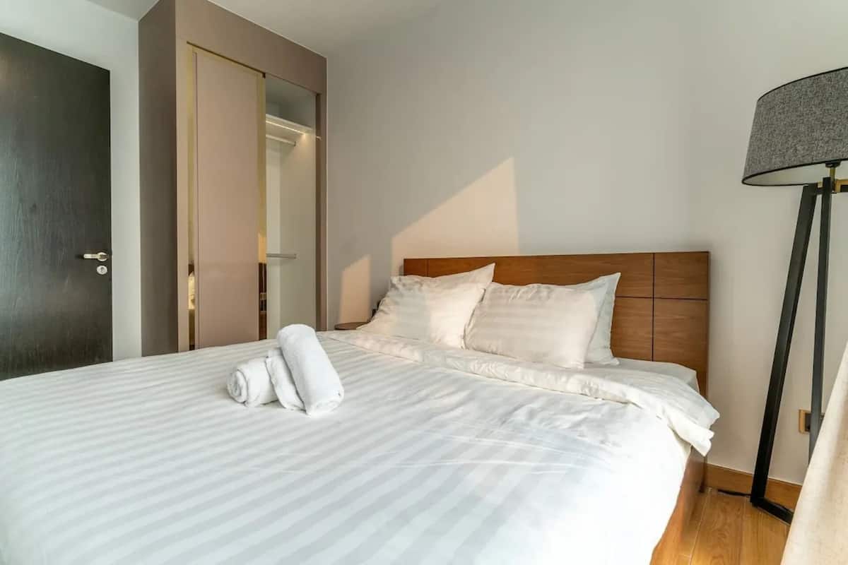 Memory-foam beds, desk, laptop workspace, blackout curtains