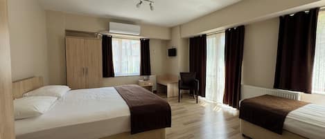 Standard Triple Room | Minibar, in-room safe, free WiFi