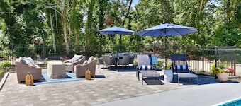 "Happy Ours: Where Poolside Bliss Meets Ocean Breeze!"