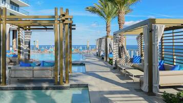 Outdoor pool, free cabanas, pool umbrellas