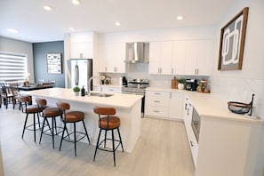 Fridge, microwave, oven, stovetop - Edgemont Retreat | AC | WEM | River Cree | Disney+ (Edmonton)