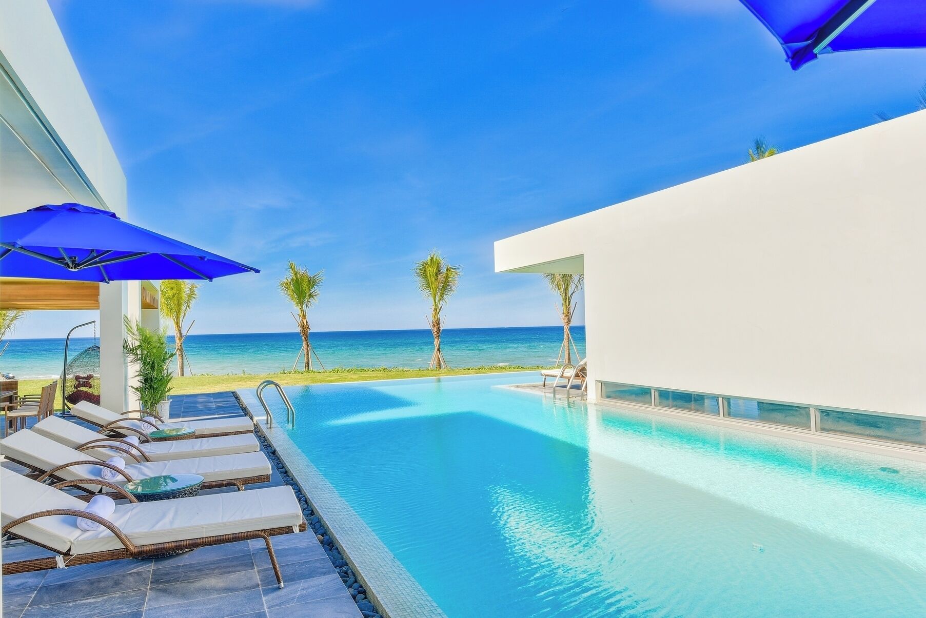 Exclusive Villa, 5 Bedrooms, Beach View, Beachfront | Living area | Flat-screen TV