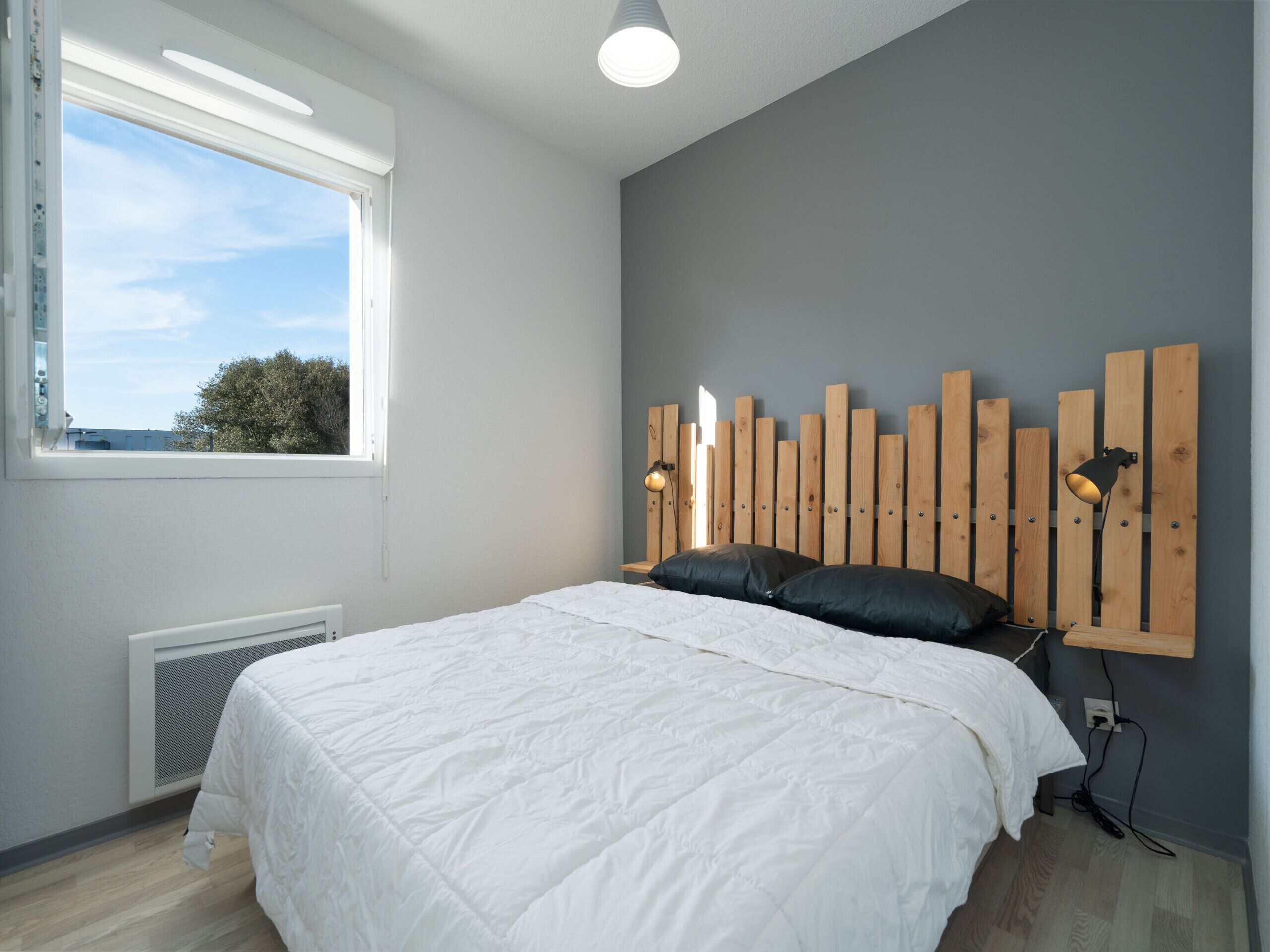 2 slaapkamers, een strijkplank/strijkijzer