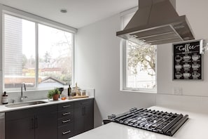 Fridge, microwave, oven, stovetop - Walk to Cap Hill from a Stylish Designer Home (Seattle)