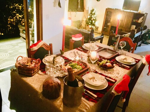House in the mountains with pool and river.