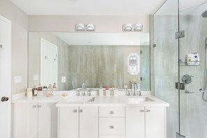 Shower, towels, soap, toilet paper