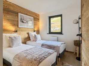 2 dormitorios, tabla de planchar con plancha, wifi gratis y ropa de cama