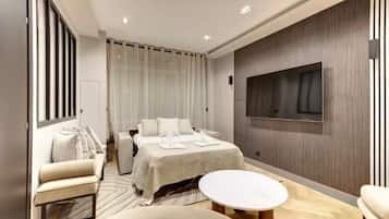 2 habitaciones, tabla de planchar con plancha y ropa de cama