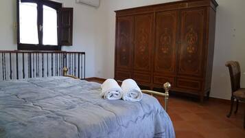 1 bedroom, desk, iron/ironing board, travel crib