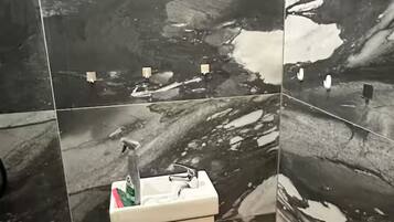 Shower, towels, soap, shampoo