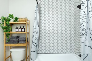 Hair dryer, towels, soap, shampoo
