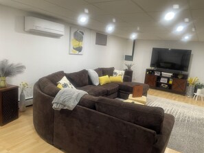 Living area - Subtle Peace Suite - Charming 2-bedroom apartment w/WiFi, AC Central to DC/MD/VA (District Heights)