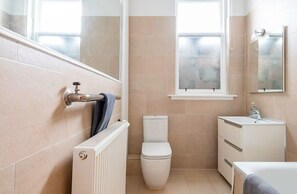 Shower, eco-friendly toiletries, hair dryer, towels